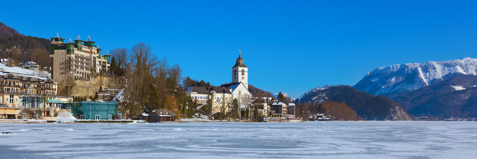 st wolfgang in winter with skiing on the mountains