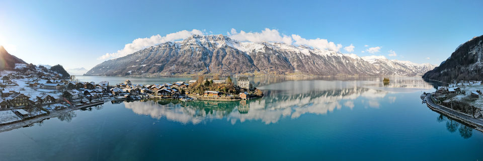 lake brienz with snowy mountains