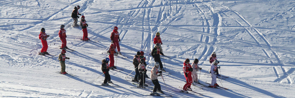 children learning to ski in st moritz