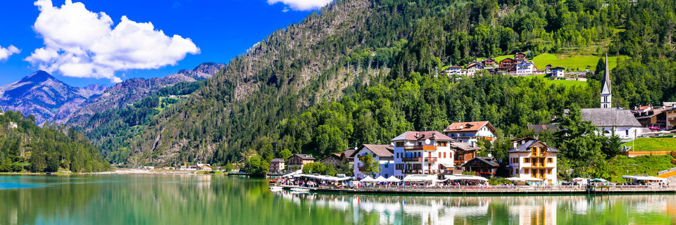 alleghe resort on the eastern shores of lake alleghe