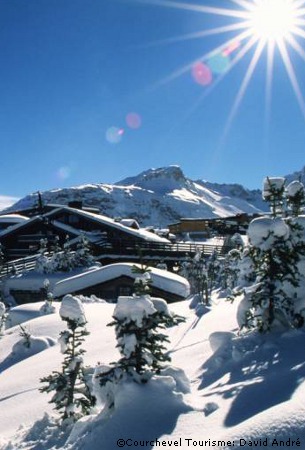 ski chalet holiday in courchevel covered in snow