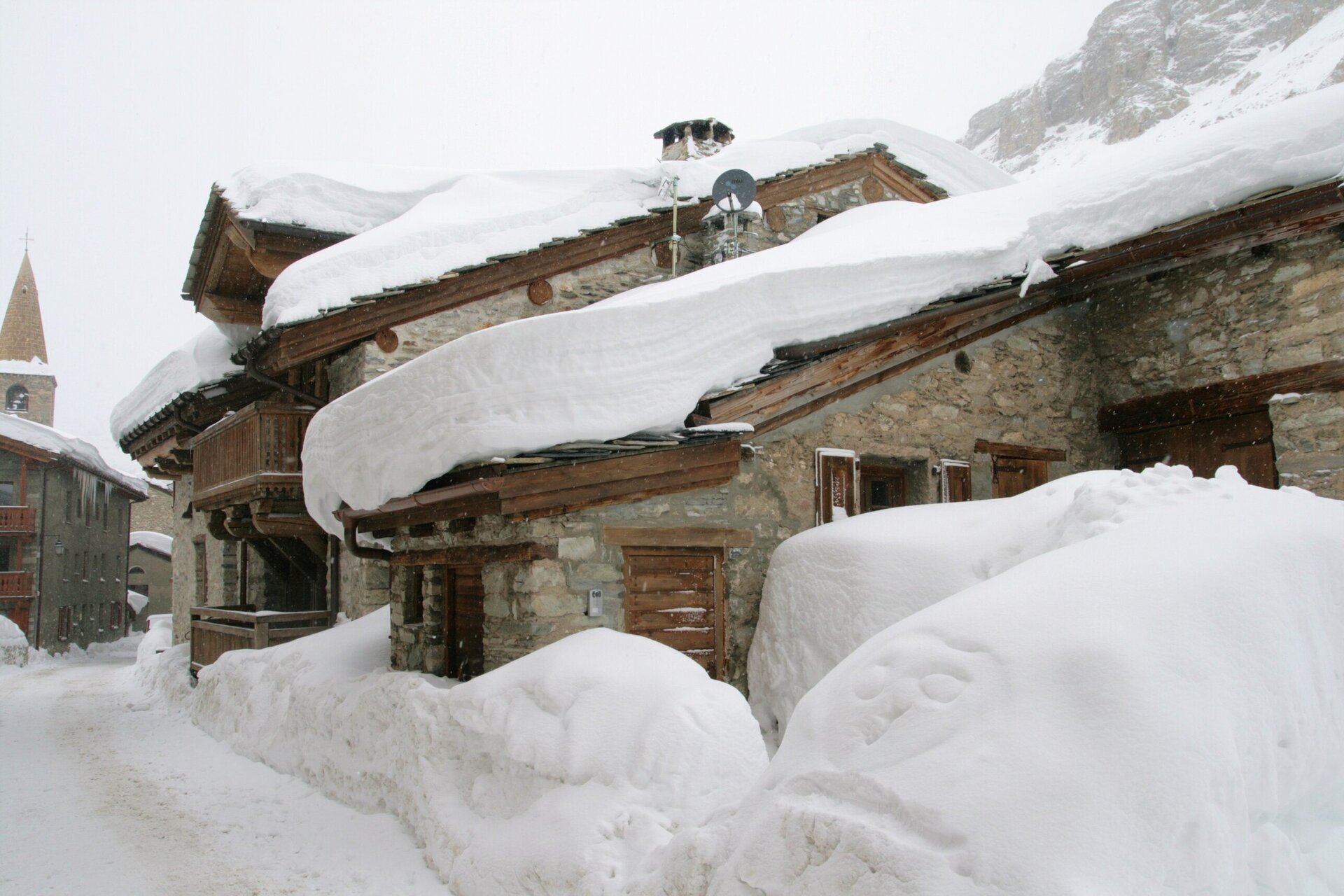 chalet in val d'isere covered in snow