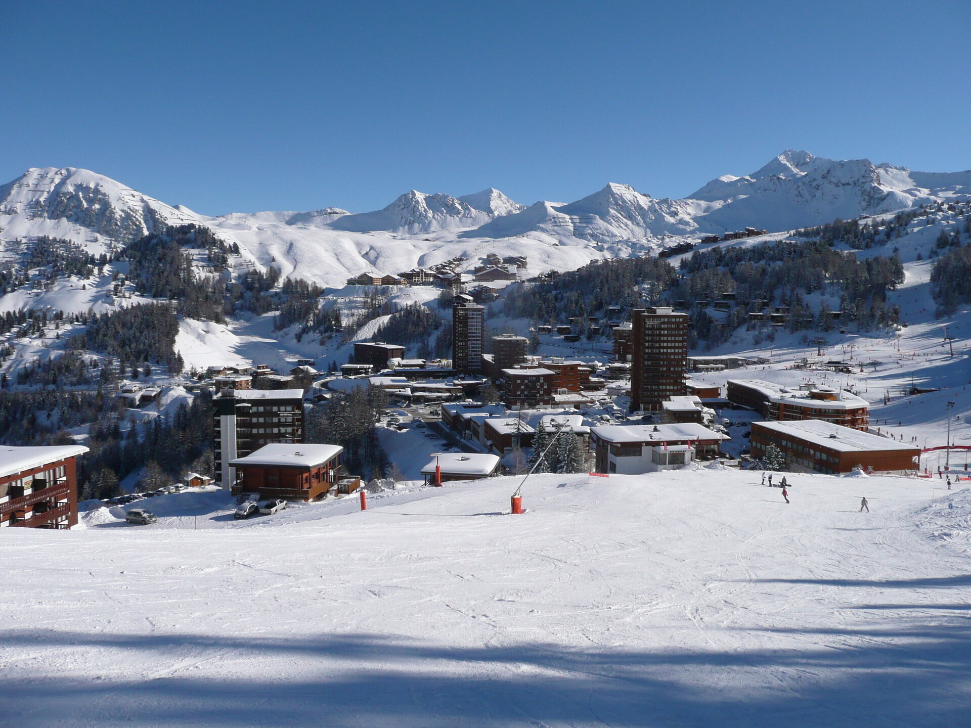 view of la plagne village in winter from the slopes