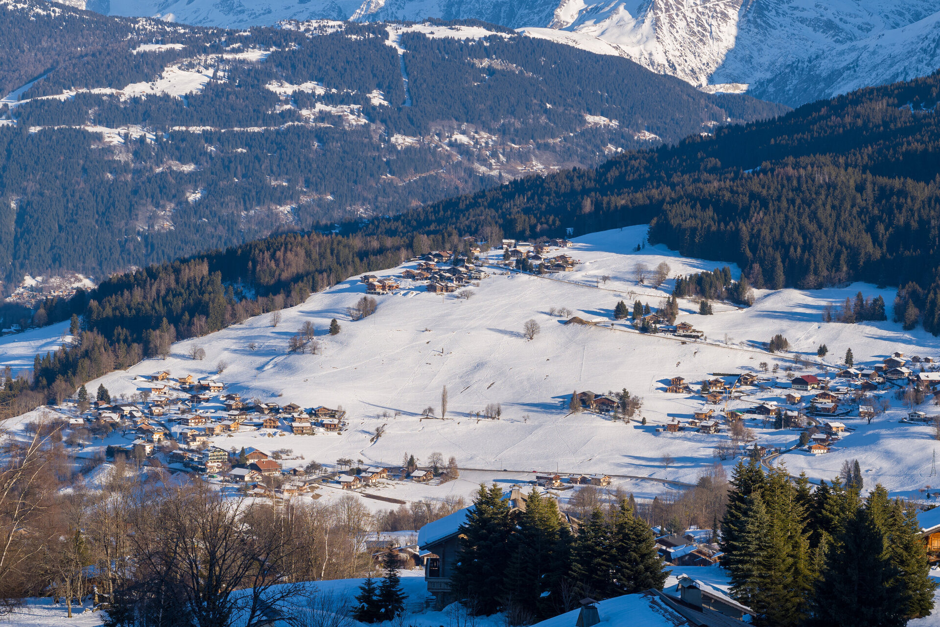 ski-in ski-out chalets in megeve covered in snow